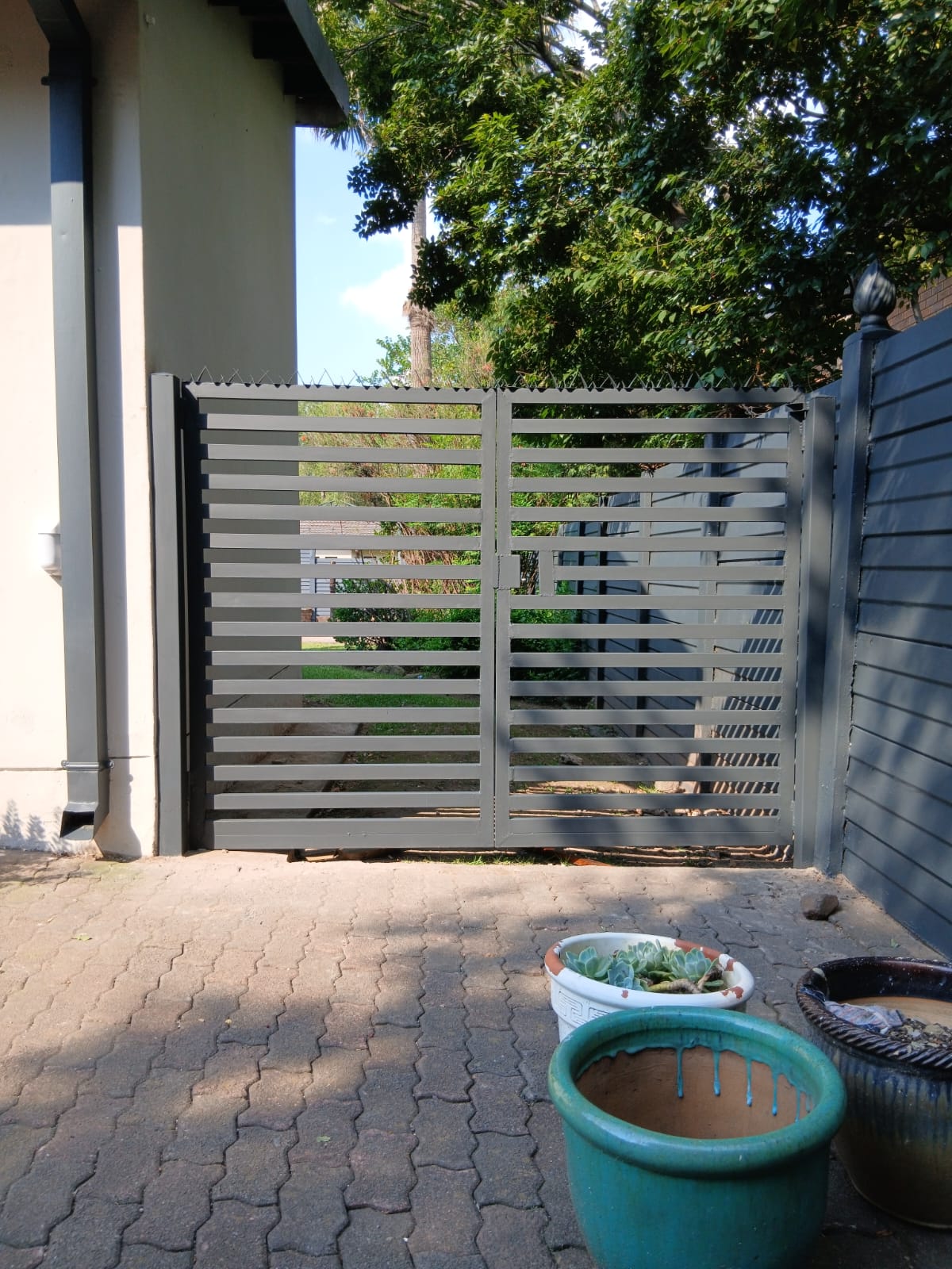 Pedestrian slat gate
